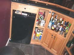 Behind bar, refrigerator & storage drawer