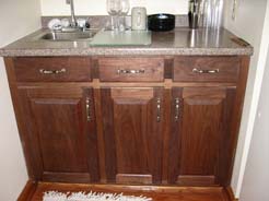Walnut cabinets in kitchenette