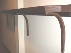 Curved drink rail supports to match bar