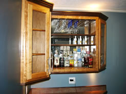 Mirror and angled end cabinets