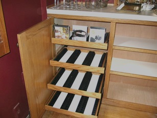 Roll-out CD trays
