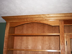 Valances with one-piece arched molding