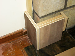 Wood blocks attached to stone & walls....