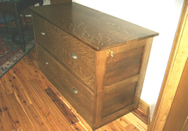 Side-mounted lock secures both drawers