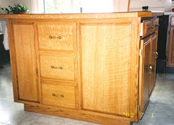 False drawer fronts for concealed wine rack