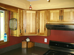 Angled corner wall cabinet