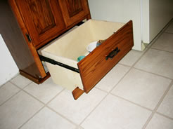 Toe kick area is part of single bottom drawer