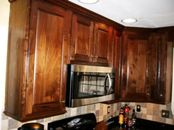 Full-height wall cabinets with microwave
