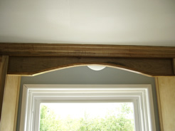 Valance with arched miolding above sink