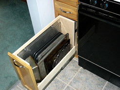 Pull-out storage for baking sheets
