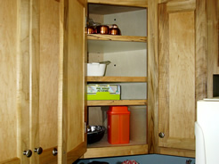Angled corner with adjustable shelves