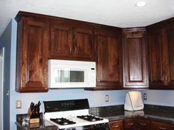 Cabinets above range with microwave
